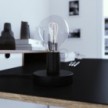 Posaluce, the black metal table lamp, with textile cable, in-line switch and english plug