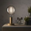 Posaluce Natural, the 14,2 cm natural wood table lamp, with textile cable, in-line switch and english plug