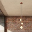 3-light multi-pendant lamp featuring fabric cable and metal finishes